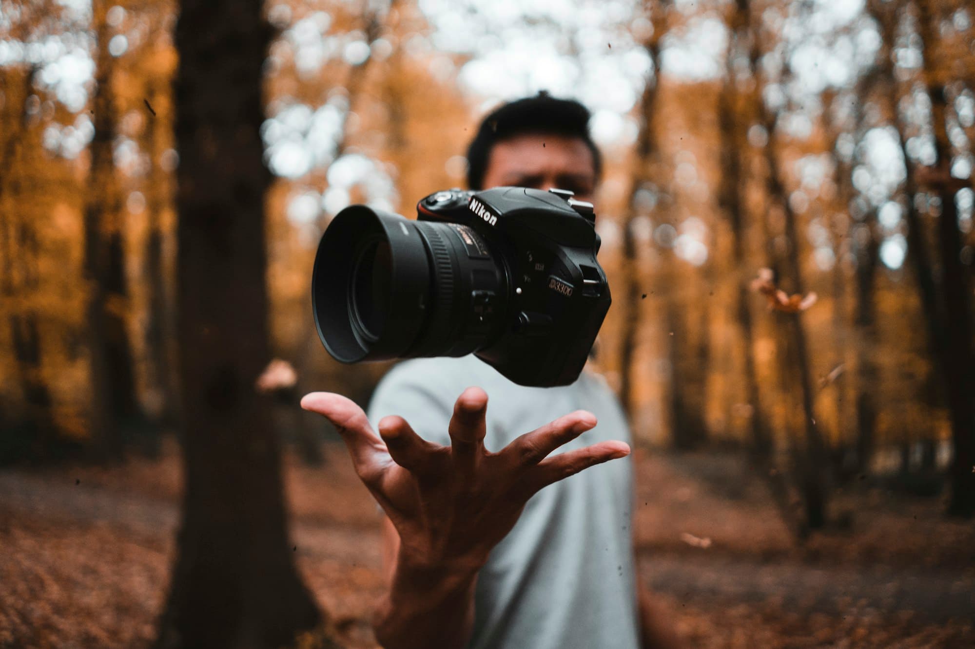 Photographer holding camera